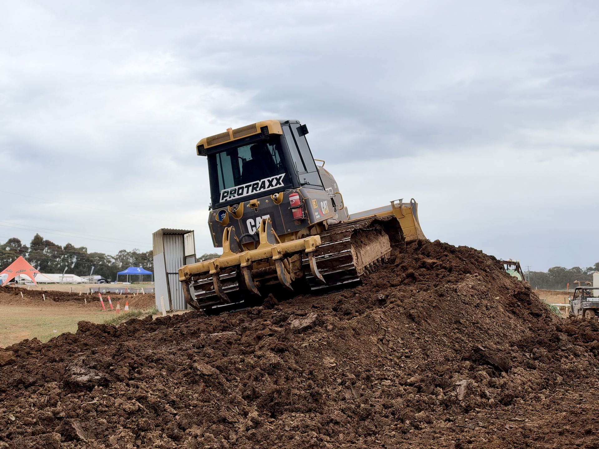 Protraxx dozer shaping the junior motocross track at AJMX 2026