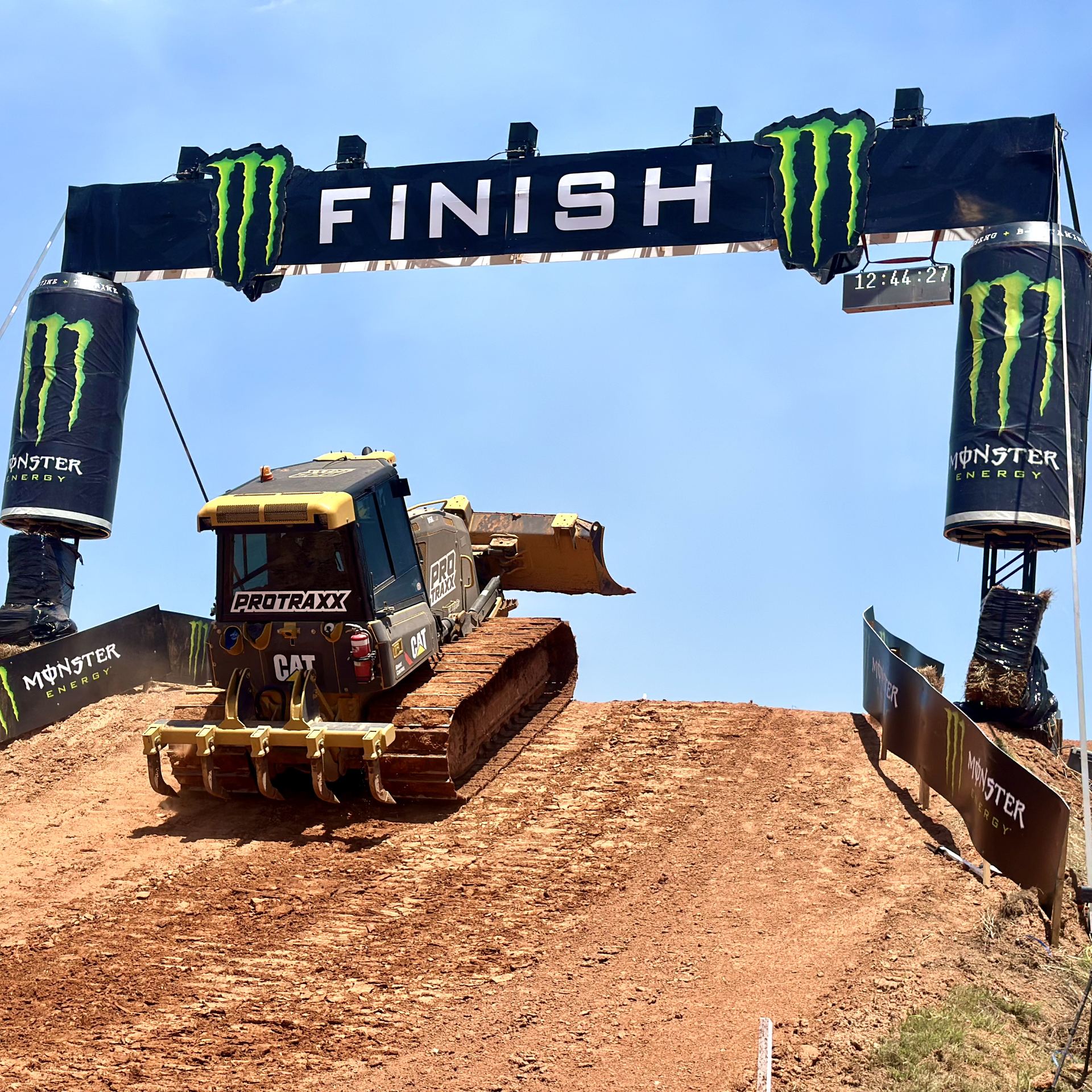 Protraxx dozer working under the finish line arch at MXGP Darwin Protraxx dozer working under the finish line arch at MXGP Darwin